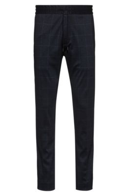 Tapered-fit trousers in check-print stretch jersey, Dark Blue