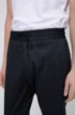 Tapered-fit trousers in check-print stretch jersey, Dark Blue