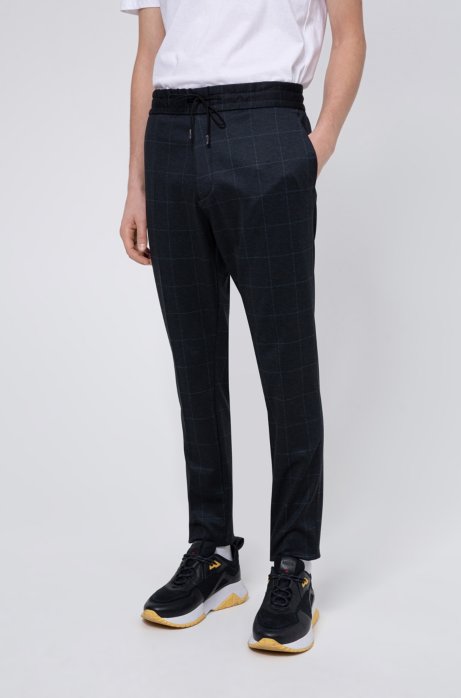 Tapered-fit trousers in check-print stretch jersey, Dark Blue