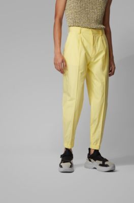 yellow tapered trousers