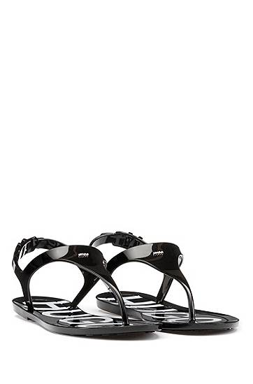 Hugo High-gloss Thong Sandals With Logo Footbed In Black