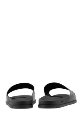 white hugo boss sliders