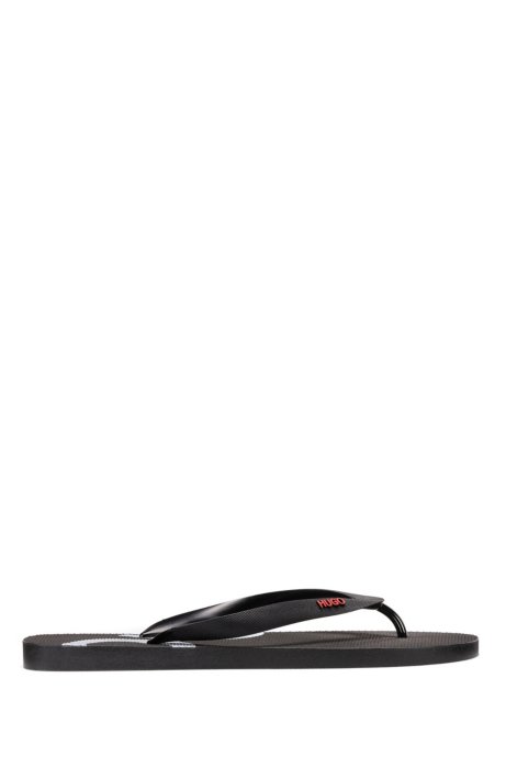 Rubber flip-flops with contrast logos, Black