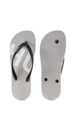 Rubber flip-flops with contrast logos