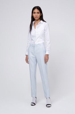 light blue cigarette trousers