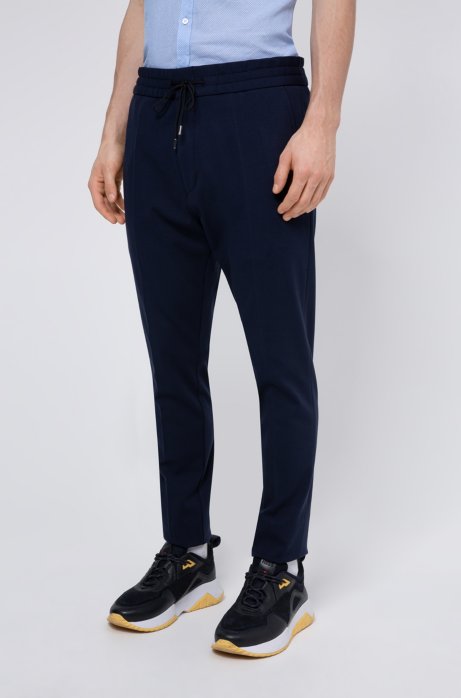 Tapered-fit trousers in pinstripe jersey with drawcord, Dark Blue