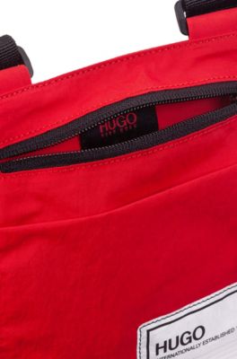 HUGO - Zip-close reporter bag in 