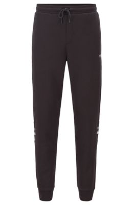 hugo boss tracksuit black and gold