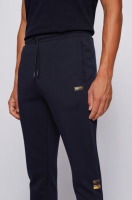 BOSS - Jogging trousers in double-faced jersey with logo details