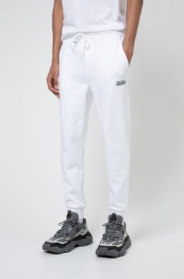 white jogging trousers