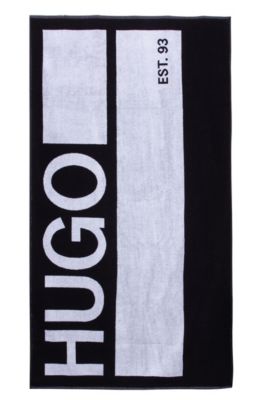 HUGO - Beach towel in terry cotton with 
