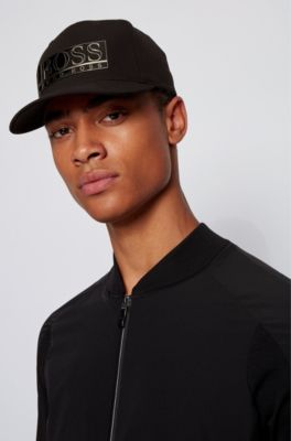 Stretch-twill cap with metal logo plate