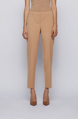 brown cropped trousers