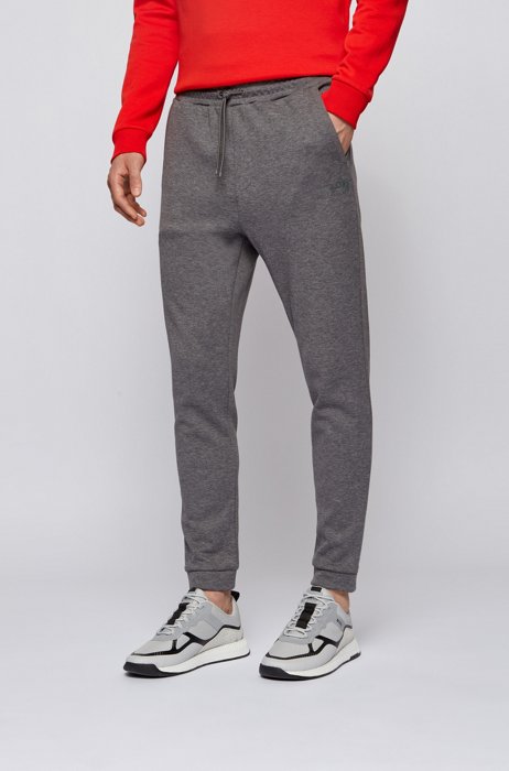 Double-faced cotton-blend tracksuit bottoms with curved logo, Grey