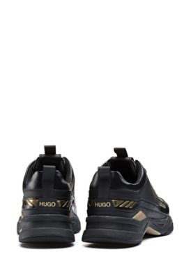 black and gold hugo boss trainers