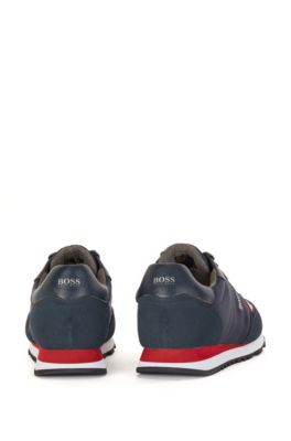 Hugo Boss Retro-inspired running trainers with suede trims. 5