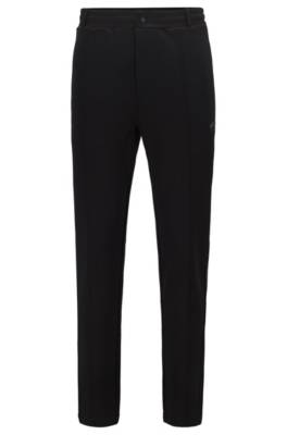 Bas de survêtement Relaxed Fit avec motif artistique réfléchissant emblématique de la collection