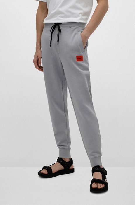 Cotton tracksuit bottoms with red logo patch, Silver