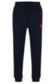 Cotton tracksuit bottoms with red logo patch, Dark Blue