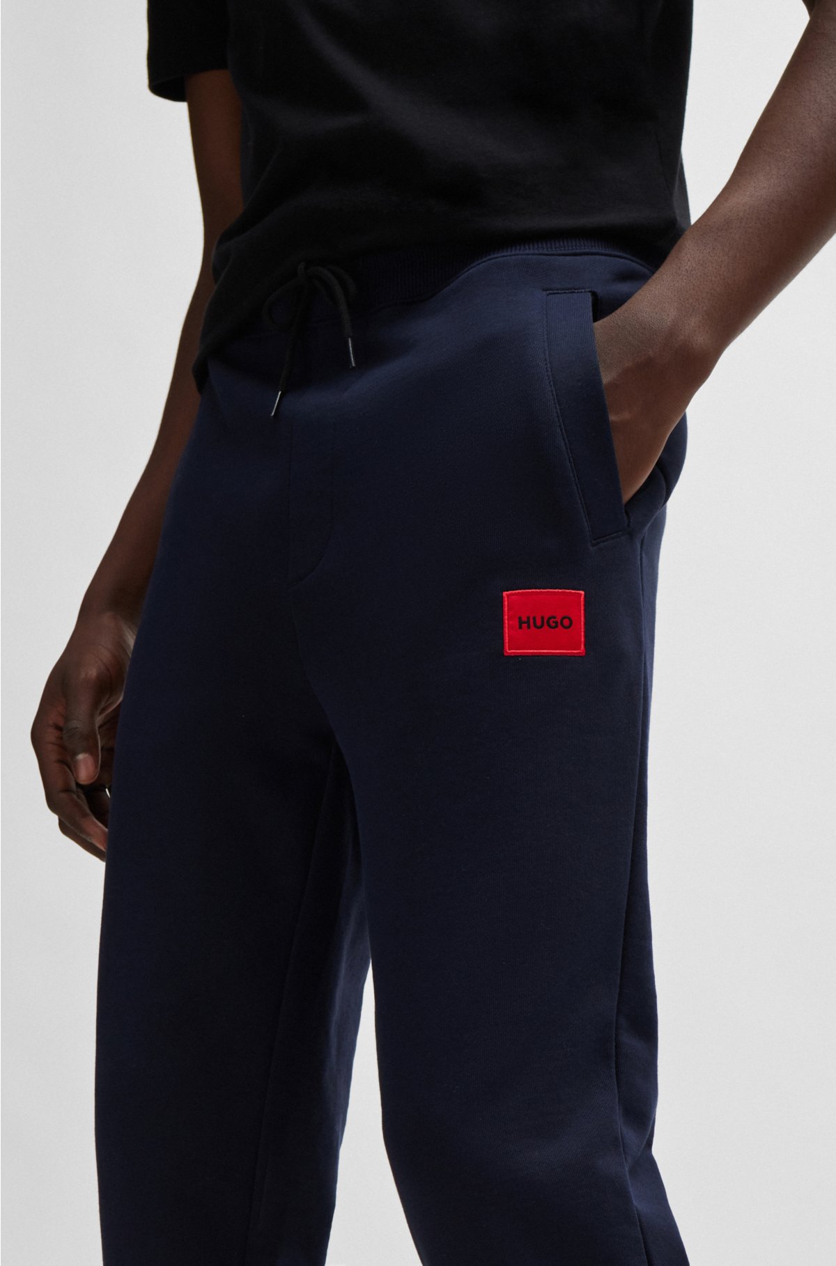 Pantalones de chándal en felpa de algodón con etiqueta con logo