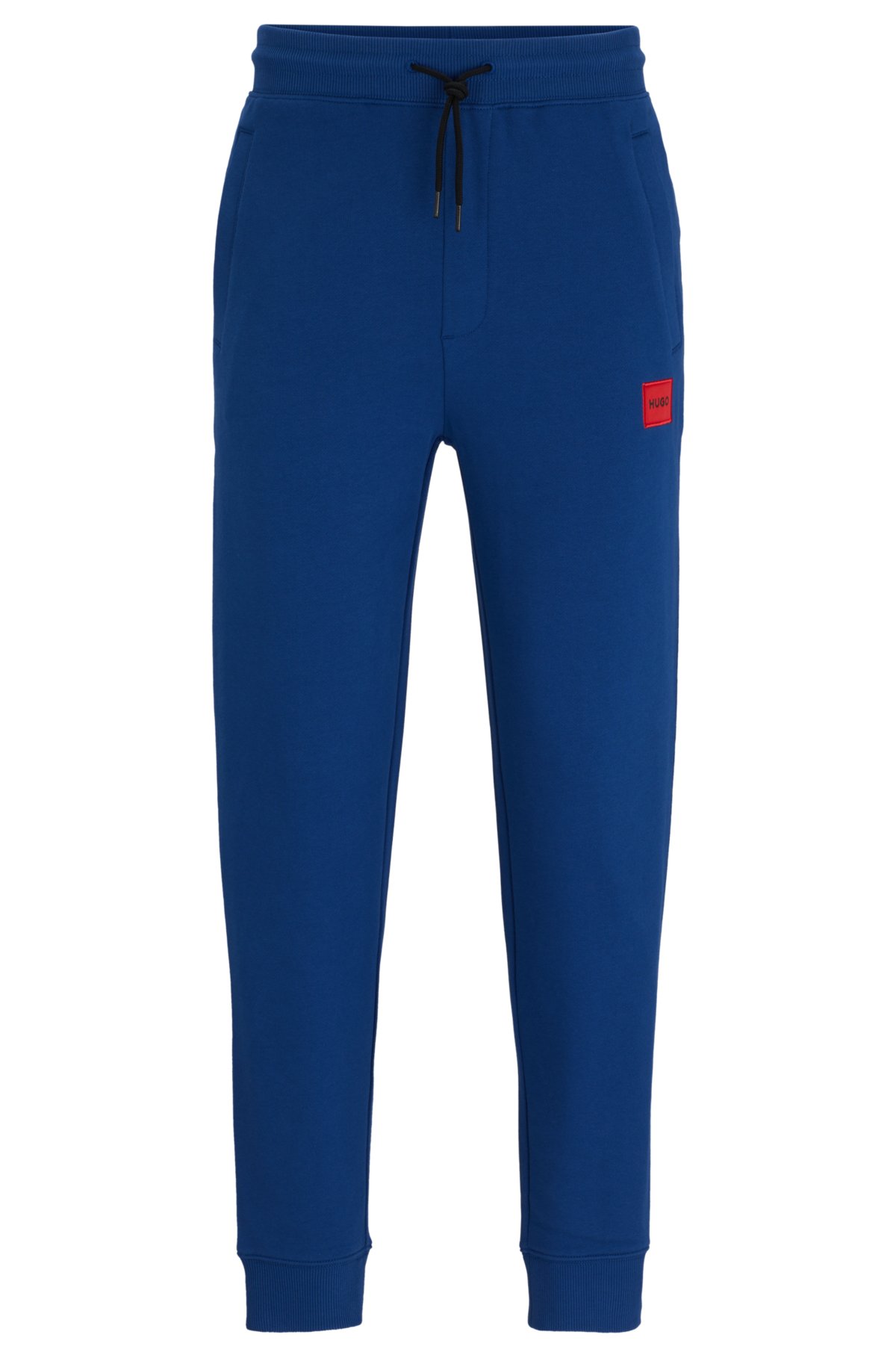 HUGO - Pantalones de chándal en felpa de algodón con etiqueta con logo roja