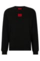 Sweatshirt aus Baumwoll-Terry mit rotem Logo-Etikett, Schwarz