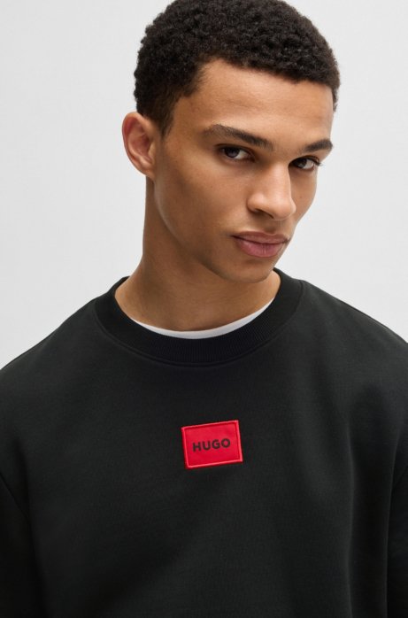 Shop Hugo Cotton-terry Regular-fit Sweatshirt With Logo Label In Black