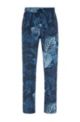 Pantalones de chándal regular fit con estampado botánico, Azul oscuro