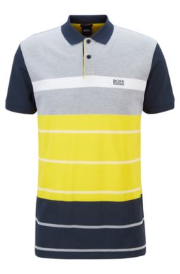 grey and yellow polo shirt