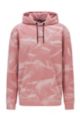 Relaxed-fit hoodie in French terry with bleach spray, light pink