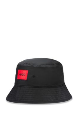 Bucket hat with red reverse-logo patch