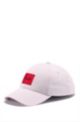 Cap in cotton twill with red logo label, light pink