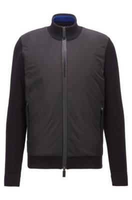 Veste matelassée zippée avec manches en maille