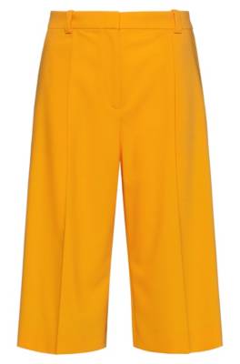 Short Relaxed Fit en tissu stretch, à jambes évasées