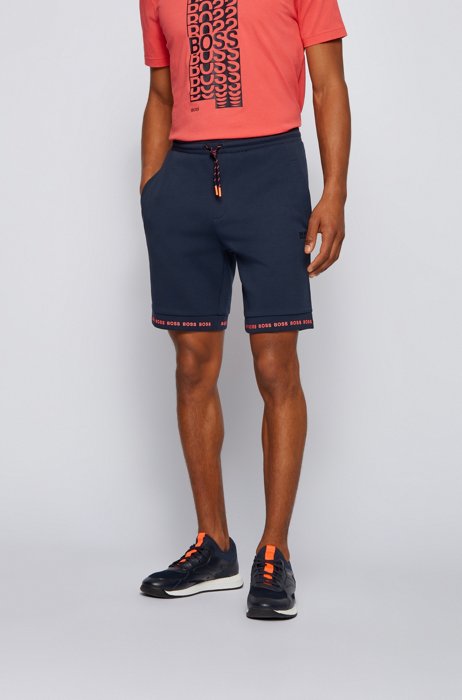 Shorts regular fit en punto elástico con logo en los bajos, Azul oscuro