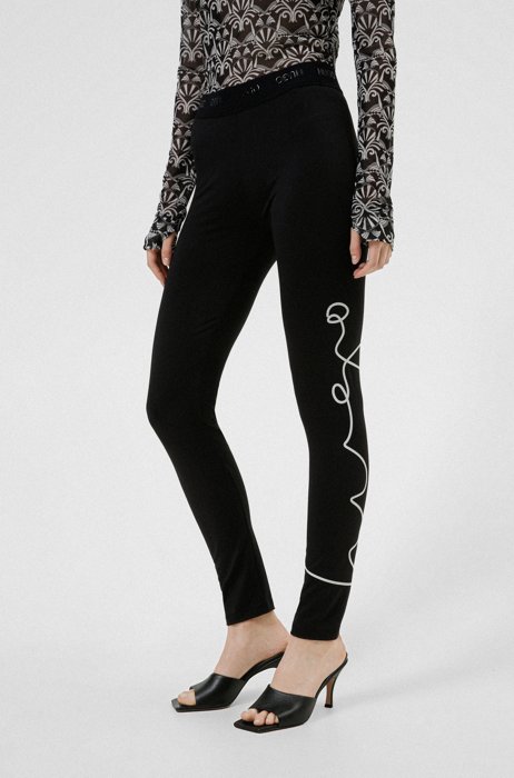 Skinny-fit legging met handgeschreven logoprint, Zwart