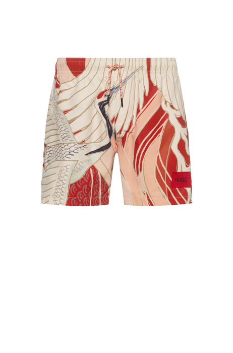 Quick-dry swim shorts in patterned recycled fabric, Red Patterned