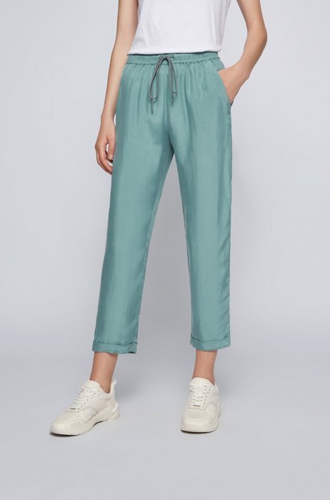 Regular-fit cropped tracksuit bottoms in lightweight fabric, Light Green
