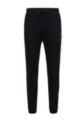 Pantalones de chándal con puños en algodón con estructura de piqué tonal, Negro