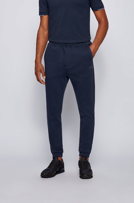 Pantaloni della tuta con fondo gamba elastico in cotone con lavorazione piqué tono su tono, Blu scuro
