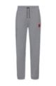 Cotton-terry tracksuit bottoms with logo label, Grey