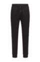 Regular-fit tracksuit bottoms in organic cotton with stretch, Black