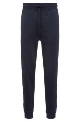 Pantalon de survêtement en coton mélangé avec logos sur les coutures latérales
