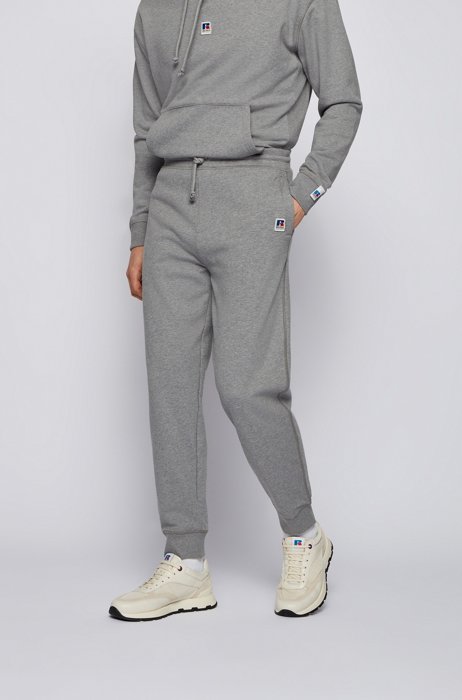 Cuffed tracksuit bottoms in organic cotton with exclusive logo, Grey