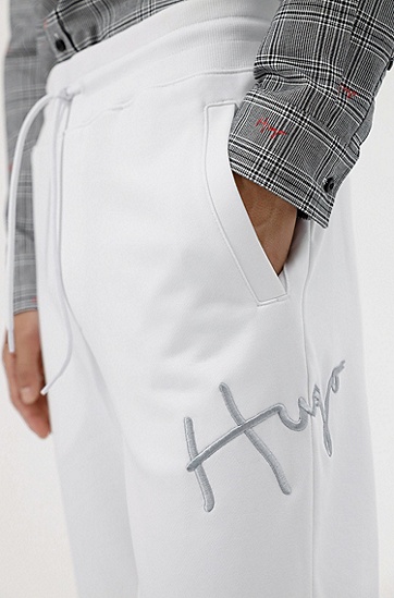 手绘徽标图案棉质束口运动裤,  100_White