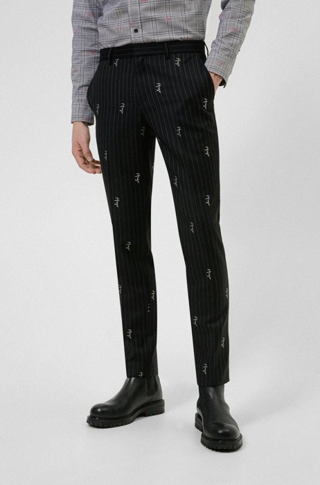 Pinstripe slim-fit trousers with handwritten logos, Black