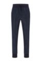 Tracksuit bottoms in mixed materials with logo detailing, Dark Blue