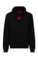 Hooded sweatshirt in terry cotton with red logo label, Black