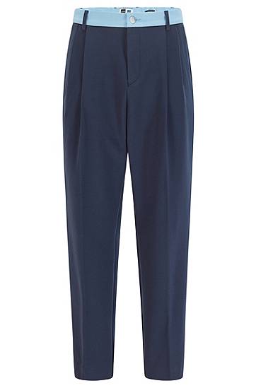 Pantalon Tapered Fit avec finition contrastante et logo exclusif