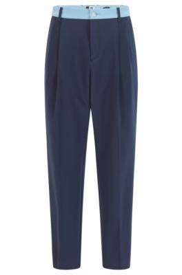 Pantalon Tapered Fit avec finition contrastante et logo exclusif